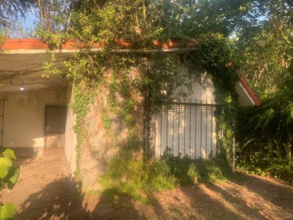 Vendemos Terrenos en PNLG (con escritura) C/ Inmueble para refaccionar o demoler.