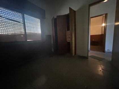 Vendemos Terrenos en PNLG (con escritura) C/ Inmueble para refaccionar o demoler.