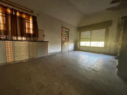 Vendemos Terrenos en PNLG (con escritura) C/ Inmueble para refaccionar o demoler.