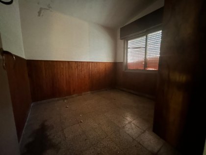 Vendemos Terrenos en PNLG (con escritura) C/ Inmueble para refaccionar o demoler.